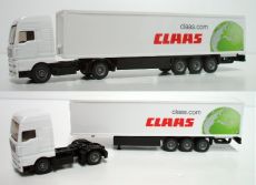 1627 Man mit Trailer / Auflieger und Claas Werbung