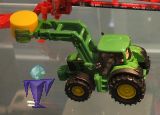 1379 John Deere 7530 mit Frontlader und Ballengreifer